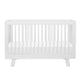 A  3-in-1 convertible crib with toddler bed conversion kit in white